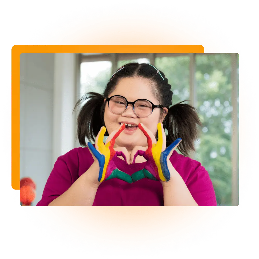 Disabled woman making love heart shape with her hands