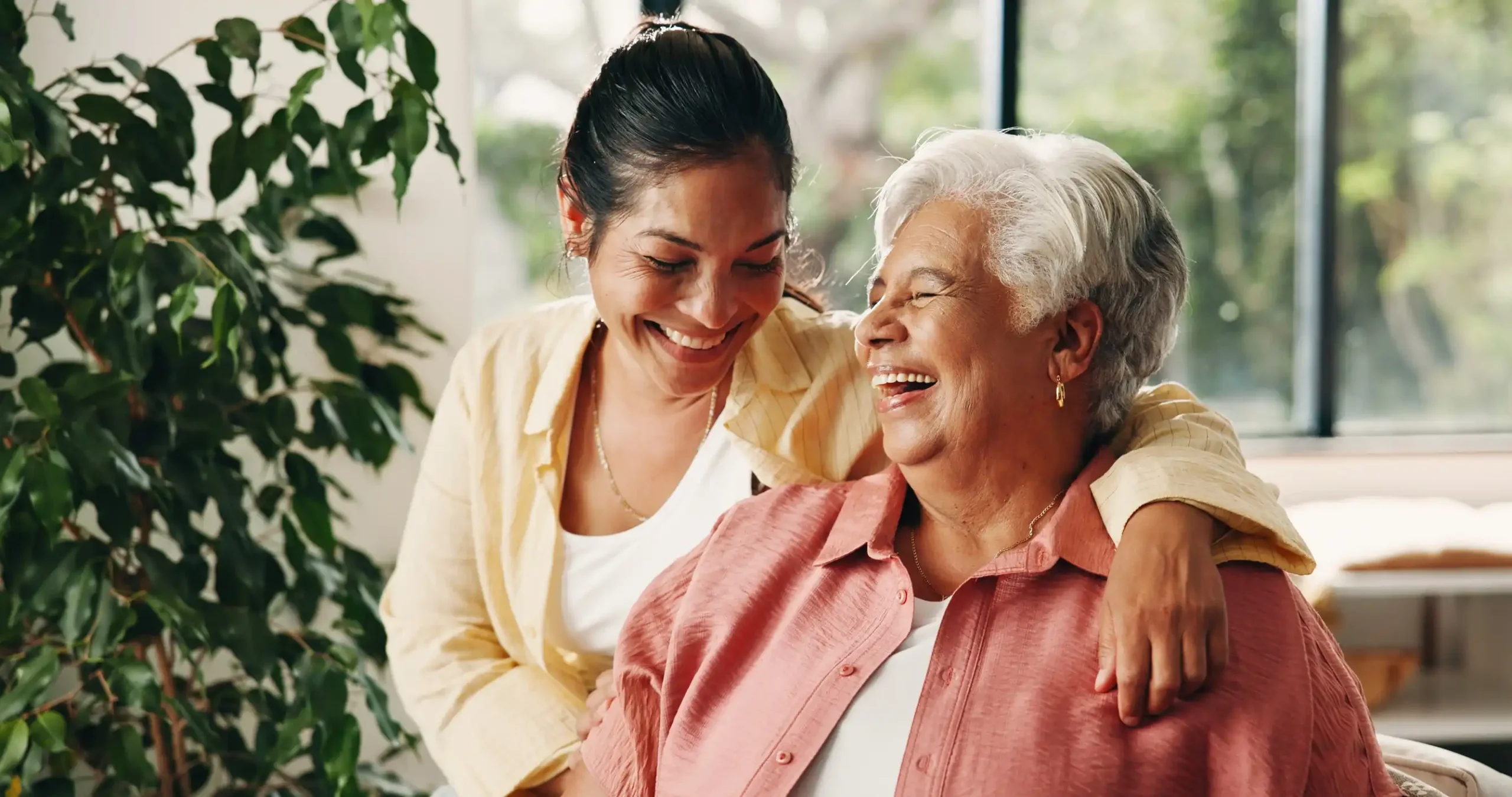 Mother and daughter laughing